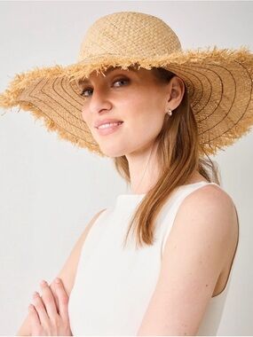 Hat Attack | braid fringe Pom accent straw wide brim hat